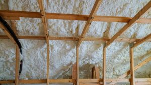 Insulation of attic with foam insulation cold barrier and insulation material polyurea Spraying, foam coating