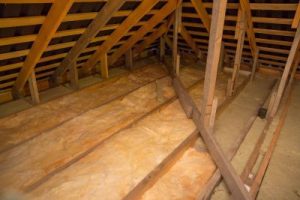 Attic space with wood framing and insulation